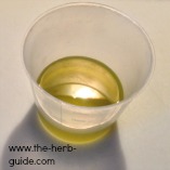 oil and essential oil mixed in a pot