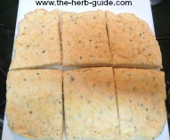 cutting the cheese scone mixture into squares