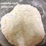 adding cheese to the rubbed in flour
