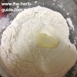 add butter to flour and herb mix