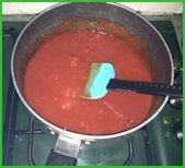 tomatoes and passata combined in a pan tomatoes and passata combined in a pan