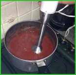 stick blender whizzing up tomatoes and passata stick blender whizzing up tomatoes and passata