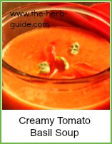 creamy tomato basil soup in a bowl