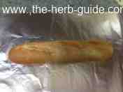 Moving sliced bread onto aluminium foil Moving sliced bread onto aluminium foil