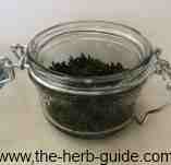 chopped mint into kilner jar chopped mint into kilner jar