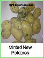minted new potatoes in a serving dish