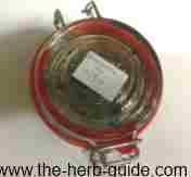 labelled jar of rosemary oil labelled jar of rosemary oil